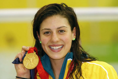 Stephanie Rice celebrates with one of her three gold medals in Beijing