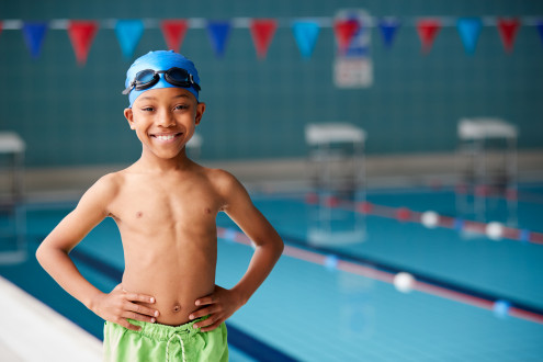 Child learning to swim Child learning to swim